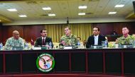 Emir H H Sheikh Tamim bin Hamad Al Thani, Deputy Prime Minister and Foreign Minister H E Sheikh Mohammed bin Abdurahman Al Thani, Commander of United States Central Command Joseph Votel, and other officers during a meeting at MacDill Air Force Base in the