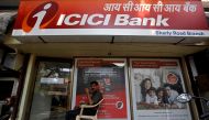 A security guard sits outside an ICICI bank branch in Mumbai, India, April 4, 2018. (REUTERS/Francis Mascarenhas)