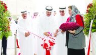 Sheikh Abdullah bin Ali bin Jabor Al Thani (third right), Chairman, Commercial Bank, inaugurates the bank’s Al Ruwais branch as Hussein Ibrahim Al Fardan (second left), Vice-Chairman and other Commercial Bank officials look on. 