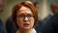 Russia's Central bank chief Elvira Nabiullina speaks with colleagues before Prime Minister speech at the State Duma, Russian parliament's lower house in Moscow on April 11, 2018. AFP / Yuri Kadobnov