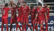 Al Duhail players celebrate after scoring a goal during a QNB Stars League match in this file photo.