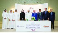 Yousuf Mohamed Al Jaida (centre), Chief Executive Officer, QFC; Sheikha Alanoud Hamad Al Thani (fourth left), Managing Director, Business Development, QFC; Ali ?brahima?ao?lu (fourth right), Chairman, A?ao?lu Group; Mehmet Burak Kutlu? (third right), Exec