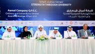 Sheikh Faisal bin Qassim Al Thani (third right), Founder and Chairman, Aamal Company; Sheikh Mohamed bin Faisal Al Thani (third left), Vice Chairman, Aamal and Sheikha Al Jazi bint Faisal Al Thani(second left), Board Member; with other officials and board