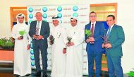 Bassel Gamal (second left), QIB Group CEO, along with Senior Executive Management members of QIB.