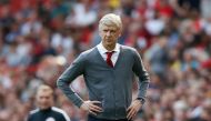 Arsenal's French manager Arsene Wenger watches on from the touch line during the English Premier League football match between Arsenal and West Ham United at the Emirates Stadium in London on April 22, 2018.  /AFP/Ian KINGTON 