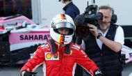 Ferrari's Sebastian Vettel celebrates winning the pole position REUTERS/David Mdzinarishvili
