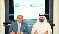 Bassel Gamal (left), QIB Group CEO, and Emad Al Khaja, INJAZ Qatar CEO, during the signing ceremony at the bank’s headquarters.
