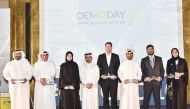 Abdulaziz bin Nasser Al Khalifa (third right), CEO, QDB & Chairman,  QBIC; and Aysha Al Mudahka (right), QBIC’s CEO, with some of the incubatees during the Demo Day celebrating the tenth wave of graduates from QBIC’s intensive LeanStartup Program (LSP).