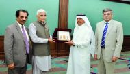 Ali Bu Sherbak Al Mansouri (second right), Assistant General-Director for government and international relations, Qatar Chamber, exchanging memento with members of visiting Pakistani trade delegation led by Muqeem Islam, Director General NAVTTC at Pakista