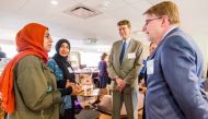 Northwestern University President Morton Schapiro and Provost Jonathan Holloway with NU-Q student Dylan Finol.