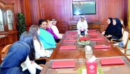 QIIB Chief Executive Officer Dr Abdulbasit Ahmad Al Shaibei (centre) with senior officials of Qatar Academy at QIIB’s headquarters.