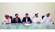 Former Atletico Madrid midfielder Gabriel Fernandez signs a two-deal with Qatar’s Al Sadd in the presence of club officials in Doha yesterday.