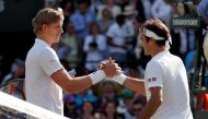 South Africa's Kevin Anderson celebrates winning his quarter final match against Switzerland's Roger Federer . REUTERS/Andrew Boyers
 