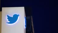 In this file photo taken on November 4, 2016, the Twitter logo is seen on a sign at the company headquarters in San Francisco (AFP / Josh Edelson) 