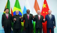 China's President Xi Jinping, Indian Prime Minister Narendra Modi, South Africa's President Cyril Ramaphosa, Brazil's President Michel Temer and Russia's President Vladimir Putin pose for a group picture at the BRICS summit meeting in Johannesburg, South 