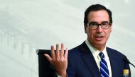 In this file photo taken on July 22, 2018 US Secretary of the Treasury Steven Mnuchin, gestures during a press conference in Buenos Aires, at the end of the G20 Finance Ministers and Central Bank Governors meeting.  AFP / Eitan Abramovich