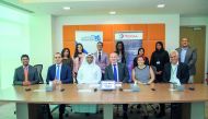 Senior officials from Total Research Center – Qatar, Hamad Bin Khalifa University’s Qatar Environment and Energy Research Institute at the signing ceremony in Doha. 