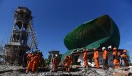 Rescue workers search for victims in a mosque which was damaged in Sunday's earthquake in Tanjung, North Lombok, Indonesia August 7, 2018.( Antara Foto/Zabur Karuru/ via REUTERS)