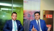 Elie El Asmar (right), Country Head of Commercial Banking, HSBC Middle East Limited, with Ahmed Fathy Al Sewedy, Vice-President, Doha Cables, speaking to The Peninsula. Pic: Abdul Basit/The Peninsula