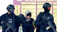 Vietnamese Doan Thi Huong, who is on trial for the killing of Kim Jong Nam, the estranged half-brother of North Korea's leader, is escorted as she leaves the Shah Alam High Court on the outskirts of Kuala Lumpur, Malaysia August 16, 2018. Reuters/Lai Seng