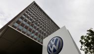 FILE PHOTO: A VW logo is seen in front of the main building of the Volkswagen brand at the Volkswagen headquarters in Wolfsburg, Germany May 19, 2017. REUTERS/Fabian Bimmer