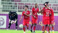 Al Duhail’s players celebrate after scoring a goal against Al Kharaitiyat in their opening Group A match of the QSL Cup at the Qatar SC Stadium yesterday.