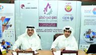 Qatar Chamber Director General Saleh bin Hamad Al Sharqi (right) and QIMC’s CEO Abdul Rahman Abdulla Al Ansari signing the sponsorship agreement at Qatar Chamber headquarters.