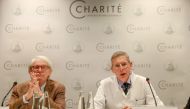 The CEO of Berlin's Charite Hospital Karl Max Einhaeupl (L) and leading doctor Kai-Uwe Eckardt address a press conference on September 18, 2018 in Berlin, on the health of Pyotr Verzilov, a member of Russian punk band Pussy Riot, who was flown to Germany 