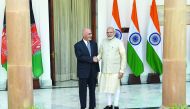 Indian Prime Minister Narendra Modi (R) shakes hand with Afghan President Mohammad Ashraf Ghani before a meeting at Hyderabad House in New Delhi on September 19, 2018. AFP / Money Sharma
