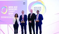 QIB officials with the awards during the New Age Banking Awards 2018 ceremony.