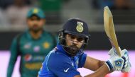 Indian cricket team captain Rohit Sharma plays a shot during the one day international (ODI) Asia Cup cricket match between Pakistan and India at The Dubai International Cricket Stadium in Dubai on September 19, 2018. / AFP / ISHARA S. KODIKARA