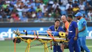 Indian cricketer Hardik Pandya is carried on a stretcher after getting injured during the one day international (ODI) Asia Cup cricket match between Pakistan and India at the Dubai International Cricket Stadium in Dubai on September 19, 2018. AFP / Ishara
