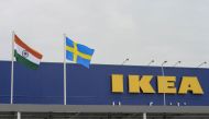 In this file photo taken on August 9, 2018 the Indian national flag and Swedish flag are pictured at the new IKEA store in Hyderabad. / AFP / NOAH SEELAM 