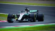 Mercedes' British driver Lewis Hamilton steers his car during the second practice session for the Formula One Japanese Grand Prix in Suzuka on October 6, 2018. AFP / Martin Bureau

