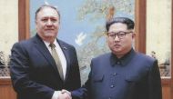 In this photo released by the US Government on April 26, 2018, North Korean leader Kim Jong-Un (R) shakes hands with US Secretary of State Mike Pompeo in Pyongyang over the 2018 Easter weekend. AFP PHOTO / US Government/ HO