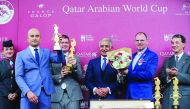 H E Sheikh Abdullah bin Khalifa Al Thani along with other participants at the presentation ceremony for Qatar Arabian World Cup in Paris, yesterday. 