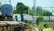 National Disaster Response Force and police personnel carry on rescue works at the site where the engine of the New Farakka Express train derailed along with eight coaches near Harchandpur Railway station in Rae Bareli on October 10, 2018.  AFP / Sanjay K