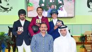 The podium winners of the Big Tour, Hamad Nasser Al Qadi, Hamad Towaim Al Marri and Cyrine Cherif pose for a photograph with officials during the awards presentation on the final day of the opening round of 2018/2019 Hathab Equestrian Tour at the Qatar Eq
