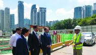 Abdullah bin Hamad Al Attiyah (second left), CEO of Qatari Diar, along with other officials at the project site in Malaysia.
