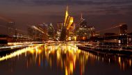 FILE PHOTO: The Frankfurt skyline with its financial district is photographed in the early evening in Frankfurt, Germany, March 25, 2018. REUTERS