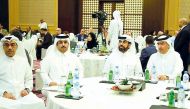 Rashid bin Ali Al Mansoori (second right), CEO of QSE, and other dignitaries during the event, yesterday.