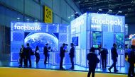 Facebook signs are seen during the China International Import Expo (CIIE), at the National Exhibition and Convention Center in Shanghai, China November 5, 2018. Reuters/Aly Song