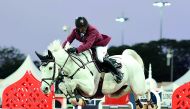 Qatar’s Bassem Hassan Mohammed guides Argelith Squid over an obstacle during the Doha 2018 CSI5* 1.45m event in the opening day of the LGCT final round at Al Shaqab Arena yesterday. 
