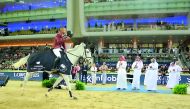 Qatari rider Bassem Hassan Mohammed acknowledges to H E Sheikh Joaan bin Hamad Al Thani, President of the Qatar Olympic Committee and the crowd after winning the Doha 2018 CSI5* 1.50m event during the final round of the Longines Global Champions Tour (LGC