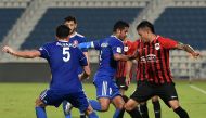 Al Rayyan’s Lucca Borges (right) vies for the ball against Al Shahaniya players during yesterday’s QSL Cup match. 