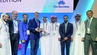 Jamal Al Kuwari (centre), Acting Chief Commercial Officer, Msheireb Properties,  with his team members during the Smart City Award ceremony in Barcelona.
