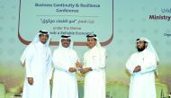 H E Dr Mohammed bin Saleh Al Sada presenting a memento to the Board Member of Qatari Businessmen Association, Sheikh Hamad bin Faisal Al Thani,  during the opening of the 2nd Business Continuity and Resilience Conference held at the Sheraton Grand Doha Re