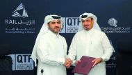 QTSBF Secretary General Tariq Zainal (left) and Chief of Strategy and Business Development Division at Qatar Rail Ajlan Eid Al Enazi shake hands after the signing ceremony yesterday.  