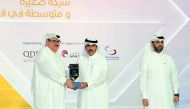 H E Sheikh Abdulla bin Saoud Al Thani, Qatar Central Bank Governor and QDB Chairman, presenting the award.