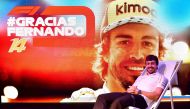 McLaren's Spanish driver Fernando Alonso poses for photographers during his farewell party at the Yas Marina circuit on November 24, 2018, in Abu Dhabi, ahead of the Abu Dhabi Formula One Grand Prix. / AFP / Andrej ISAKOVIC
